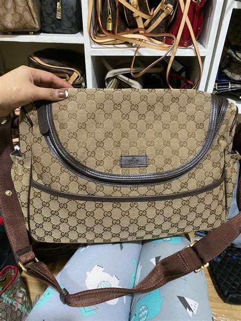 fake gucci changing bag authority|gucci bag counterfeit logo.